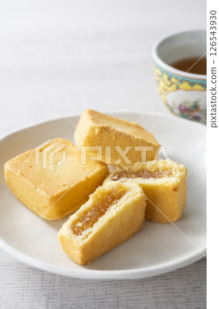 Tea time with pineapple cake 126543930