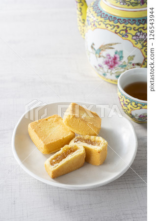 Tea time with pineapple cake Tea time with pineapple cake 126543944
