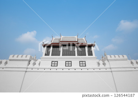 One wall of the inner palace is the Temple of the Emerald Buddha. 126544187