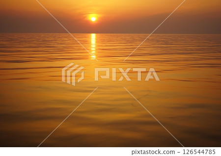 The sea dyed by the setting sun 126544785