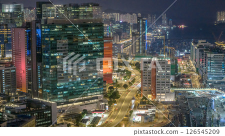 May 12 2025 Night Panorama of a Modern Cityscape with Illuminated Skyscrapers and Roads 126545209