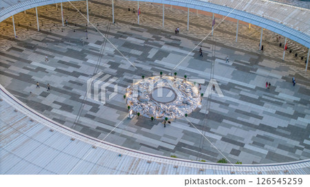 May 12 2025 View of Modern Circular Plaza with People Walking During 126545259
