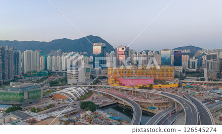 May 12 2025 Modern Urban Cityscape With Skyscrapers and Highways at Dusk May 12 2025 Modern Urban Cityscape With Skyscrapers and Highways at Dusk 126545274