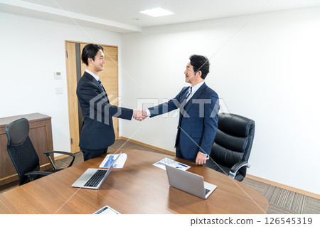 Businessman shaking hands Businessman shaking hands 126545319