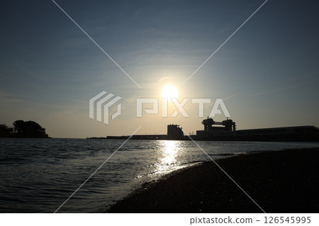 Sunset and silhouette over the sea 126545995