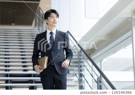 Young man in business suit Young man in business suit 126546366