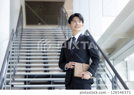 Young man in business suit 126546371