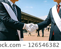 Candidates in suits shaking hands during election campaign (bottom view) 126546382