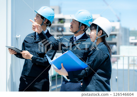 Workers working in the field 126546604