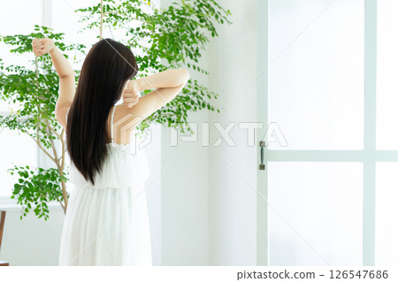 A young woman growing A young woman growing 126547686