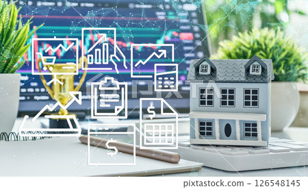 Miniature house with financial icons and stock chart in background, representing digital tools for real estate investment and market tracking Miniature house with financial icons and stock chart in background, representing digital tools for real estate investment and market tracking 126548145