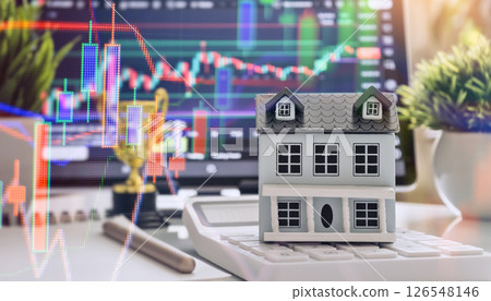 Model House on Calculator with Financial Stock Market Graph and Data Visualization for Profitable Property Trading Decisions Model House on Calculator with Financial Stock Market Graph and Data Visualization for Profitable Property Trading Decisions 126548146