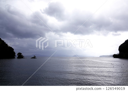 A small island floating in the cove of Ine, Kyoto Prefecture, and thick clouds A small island floating in the cove of Ine, Kyoto Prefecture, and thick clouds 126549019