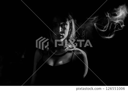 An Enigmatic and Timeless Black and White Portrait Adorned with Beautiful Pearls An Enigmatic and Timeless Black and White Portrait Adorned with Beautiful Pearls 126551006