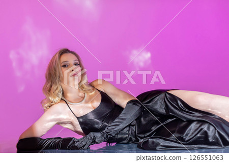 An Elegant Model Happily Posing in a Glamorous and Stunning Fashion Photo Shoot Session 126551063