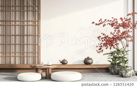 A minimalist room with Japanese-inspired decor features a low wooden table, a tea set, and potted plants. Shoji screens allow soft natural light to fill the space. 126551420