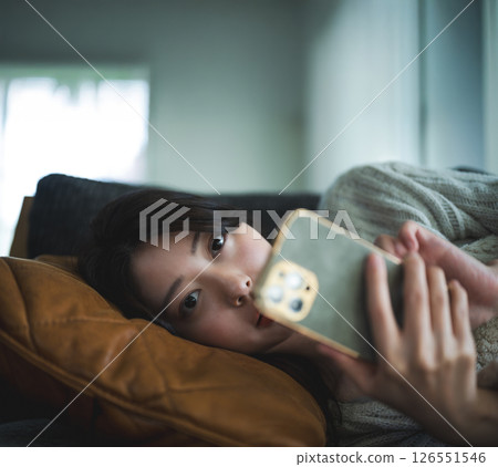 Japanese woman sleeping on the sofa Japanese woman sleeping on the sofa 126551546