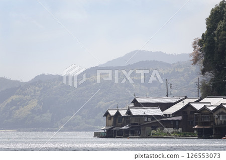 Boathouses jutting out along the coast in Ine Town, Kyoto Prefecture 126553073