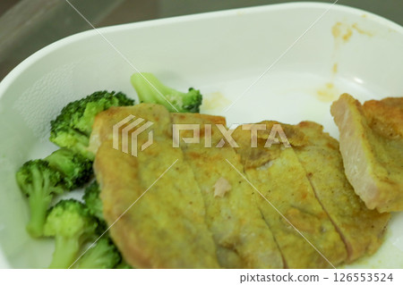 Low-calorie, low-sodium hospital food (sauteed pork) 126553524