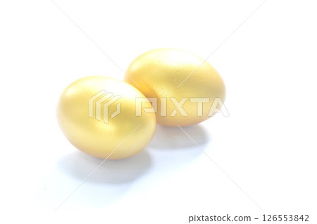 raw golden egg shell arranging on white background  126553842