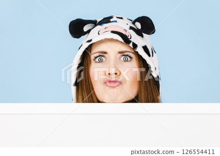 Funny girl with blank empty banner board. 126554411