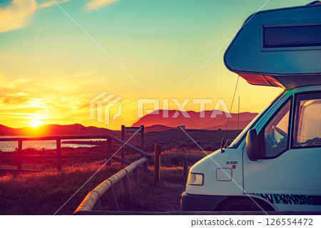 Caravan on coast at sunset 126554472