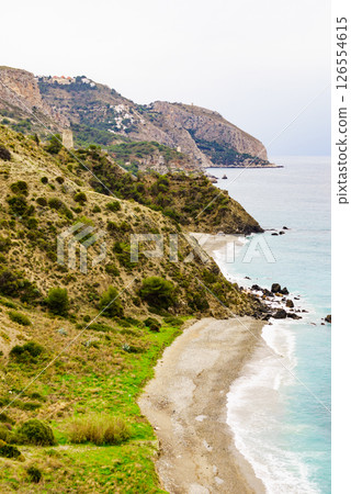 Tower on rocky coast, seaside cliffs, Spain 126554615