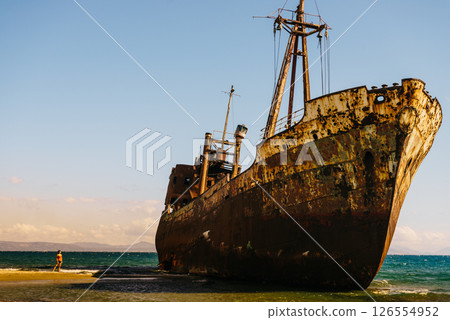 Tourist woman on beach enjoying vacation 126554952