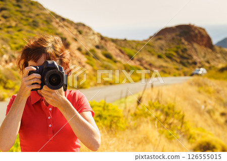Tourist take photo on nature Mani Greece 126555015