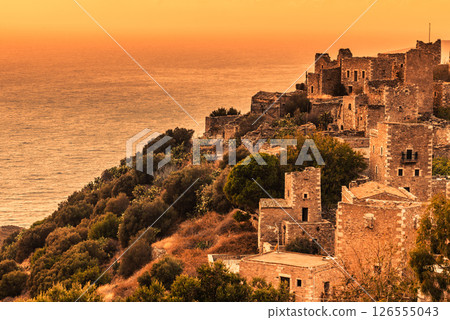 Tower houses in Vathia at sunset Greece Mani Peninsula Tower houses in Vathia at sunset Greece Mani Peninsula 126555043