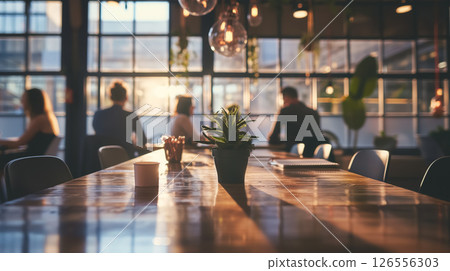 Cozy cafe interior with warm lighting. 126556303