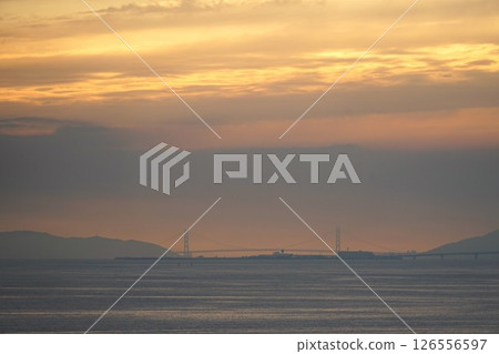 Akashi Kaikyo Bridge and Osaka Bay at dusk 126556597