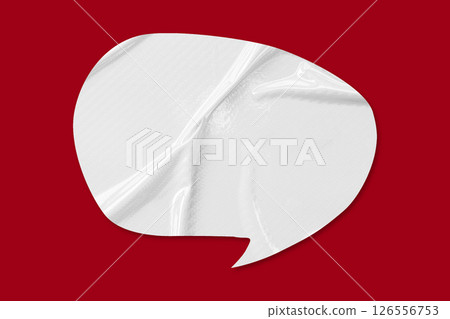White speech bubble crumpled paper isolated on red background White speech bubble crumpled paper isolated on red background 126556753