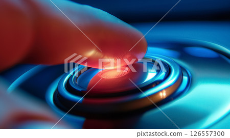 Finger pressing a futuristic glowing button. 126557300