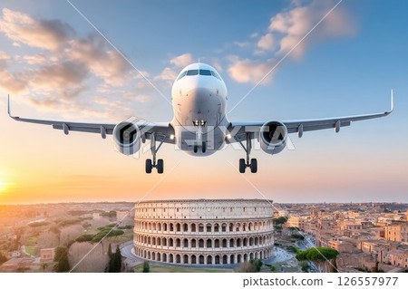 Commercial Airplane Over the Colosseum in Rome at Sunrise Commercial Airplane Over the Colosseum in Rome at Sunrise 126557977