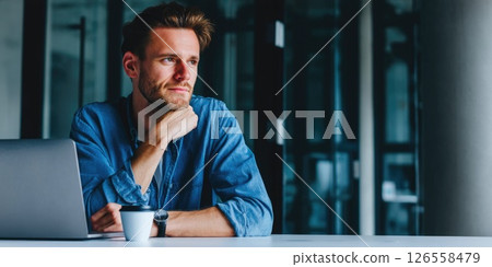 Blue Shirt Man Studying Online Blue Shirt Man Studying Online 126558479