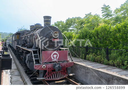 Old steam train in the park 126558899
