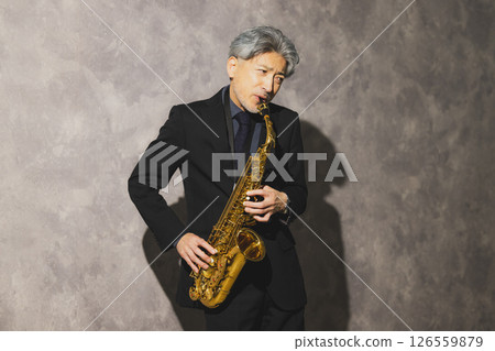 man blowing sax 126559879