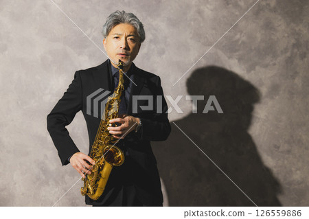man blowing sax 126559886