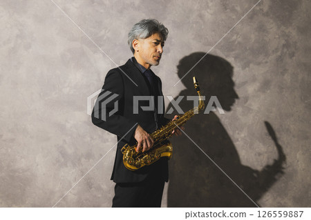 man blowing sax 126559887
