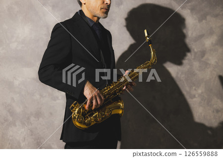 man blowing sax 126559888