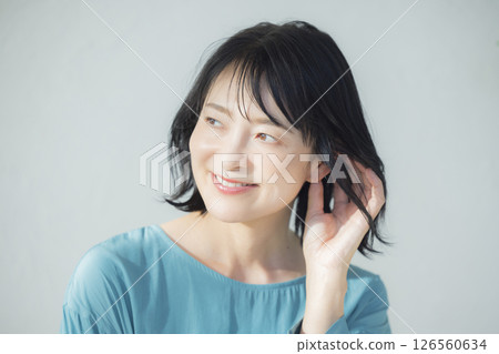 Middle-aged woman in a blue blouse 126560634