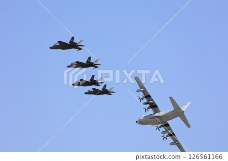 Stealth fighter jets flying in formation: F-35 126561166