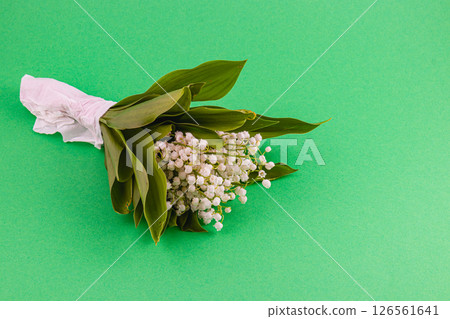 Medical professional examines patients fingers for health 126561641
