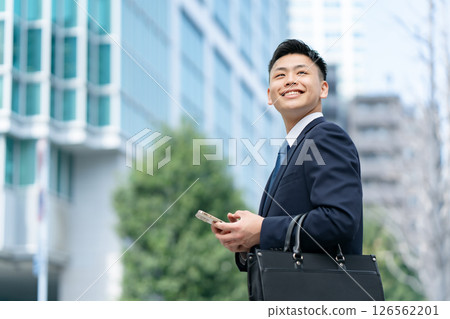 Young male business smartphone Young male business smartphone 126562201