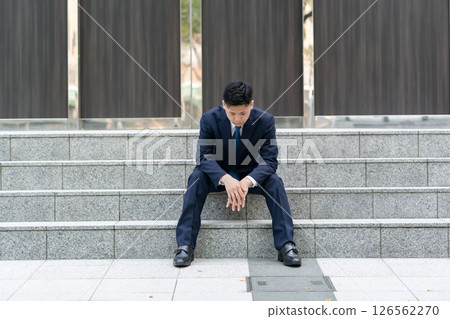 Young male business worries Young male business worries 126562270