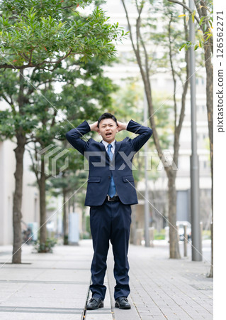 Young male business panic Young male business panic 126562271