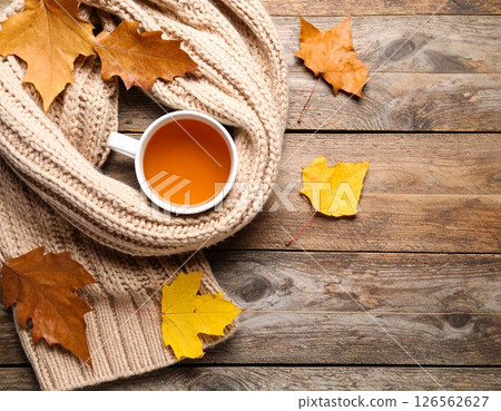 The Coming of Autumn: A tranquil teatime filled with hot tea, knitting, and autumn leaves 126562627