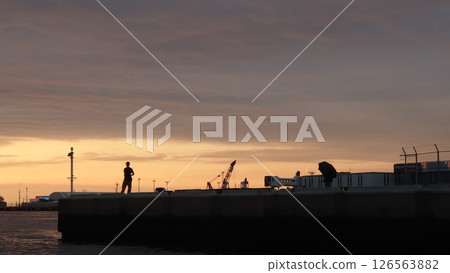People fishing on the embankment 126563882