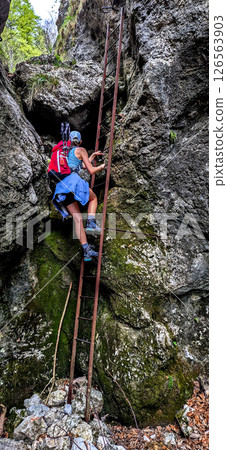 Young Woman On Via Ferrata With Ladder On Mountain Rax In The Alps In Austria 126563903